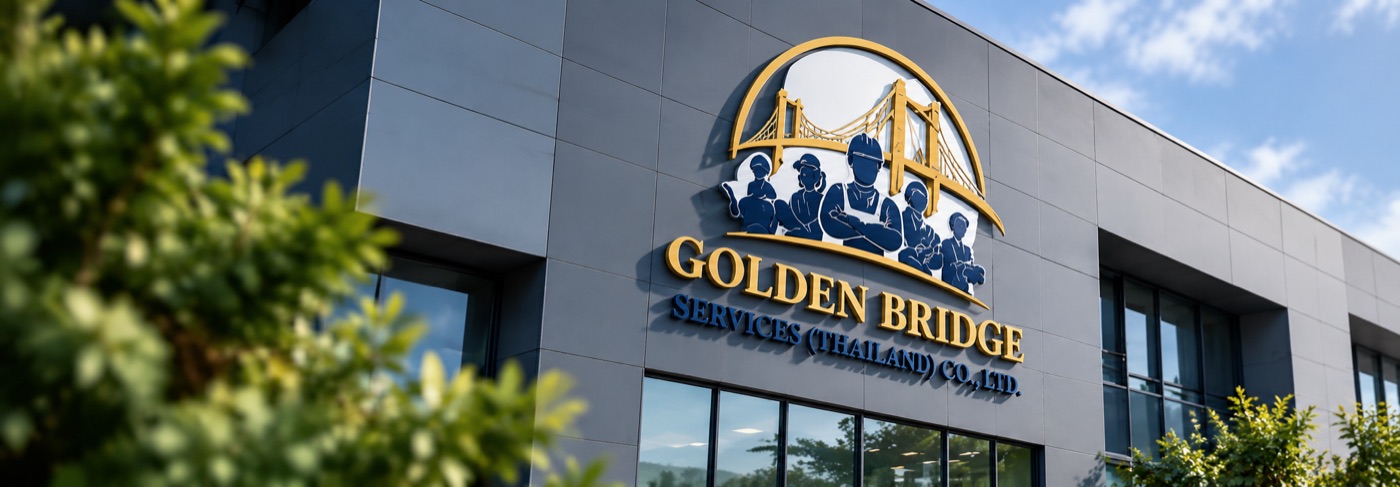 Office building with the Golden Bridge Services logo sign